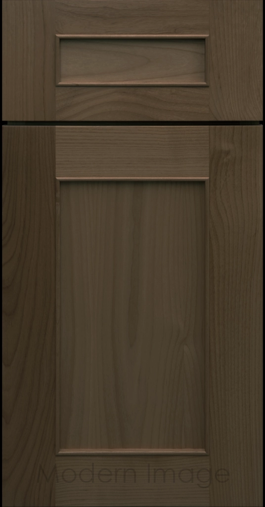 Detail view of a Chandler Shaker cabinet door in Beachwood stain with raised molding along the inner panel.